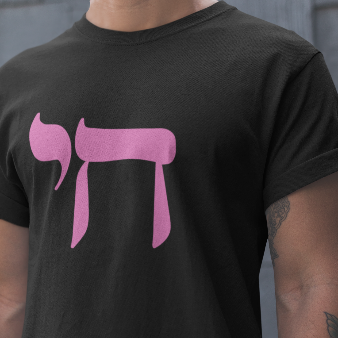 Bubblegum Pink Chai on the centre of a black shirt
