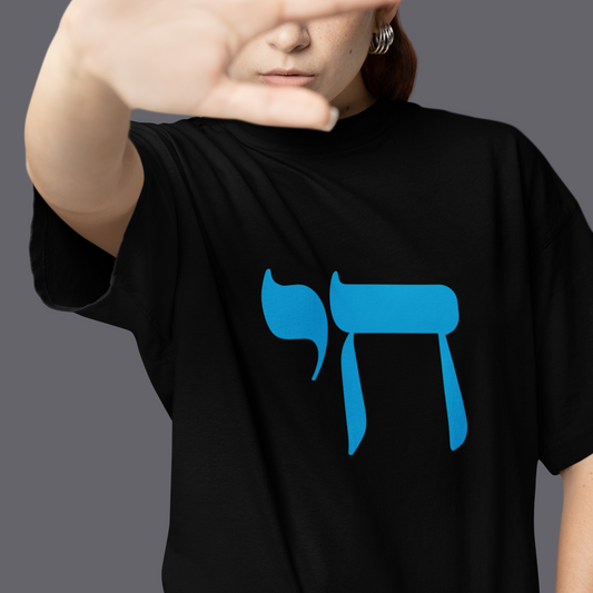 Woman in Blue Chis Graphic on a Bella Canvas Shirt
