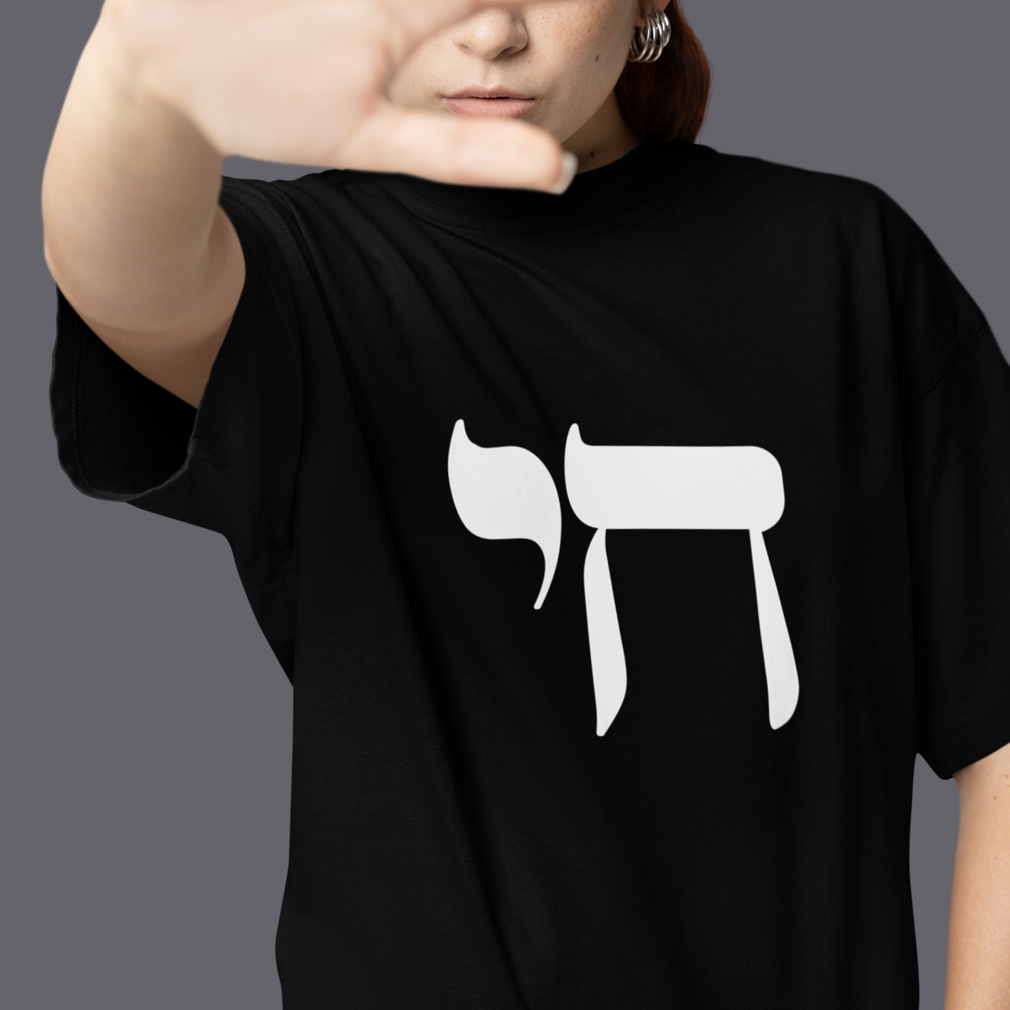 White Chai graphic on a proud jewish womans black tshirt